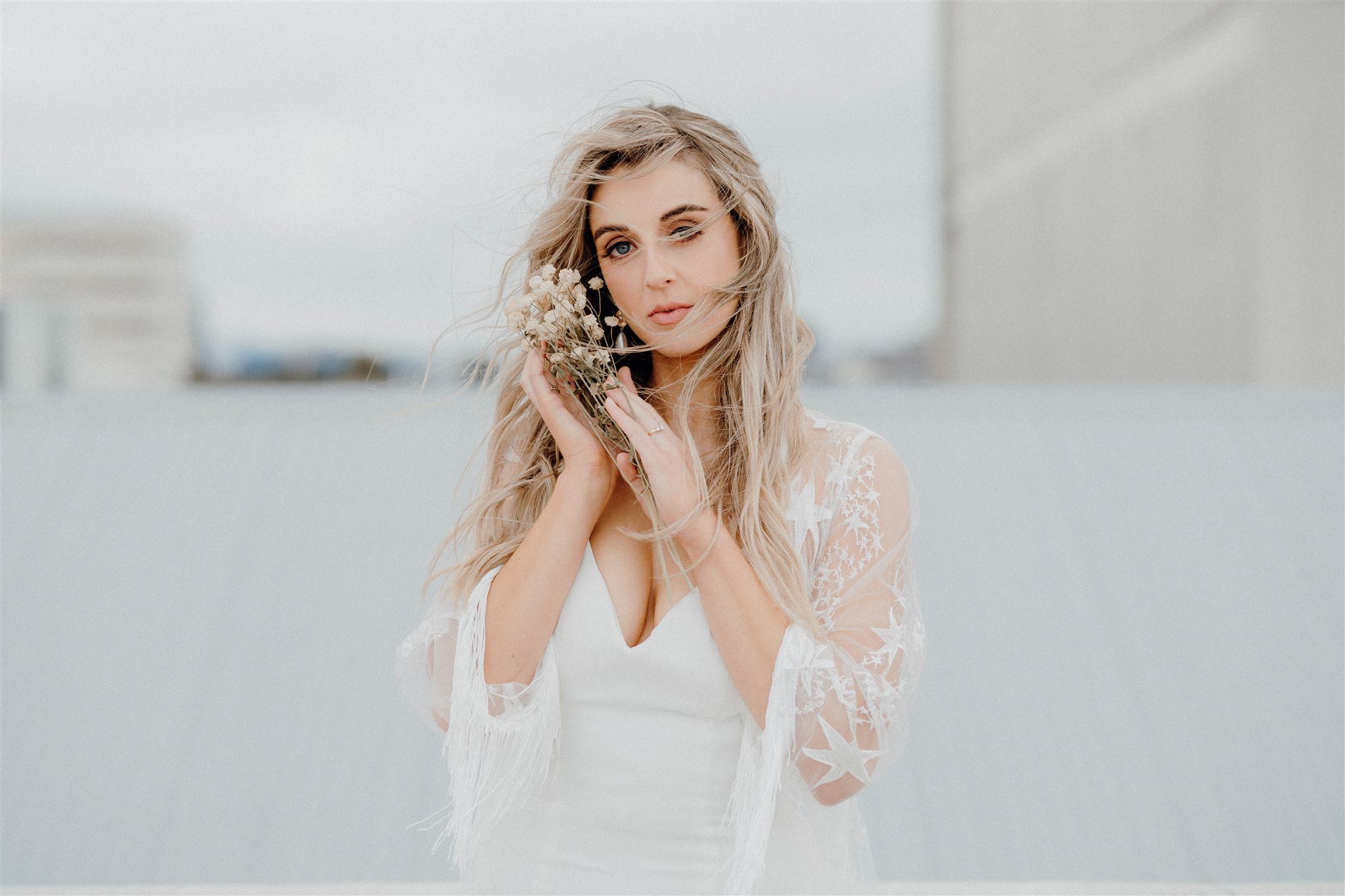 A bridal portrait of a woman wearing a custom Samantha Stokes Bridal gown in Hamilton City, photographed by Waikato Wedding Photographer Haley Adele Photography