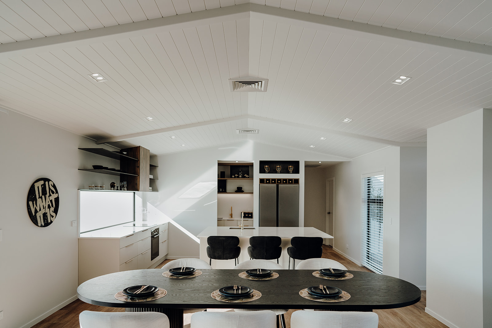 The kitchen and dining room inside of the build taupo show home, photographed by waikato commercial photographer haley adele photography